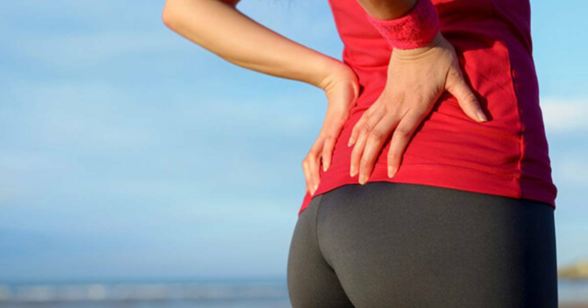 woman experiencing piriformis syndrome who needs chiropractic care from REACH Rehab + Chiropractic