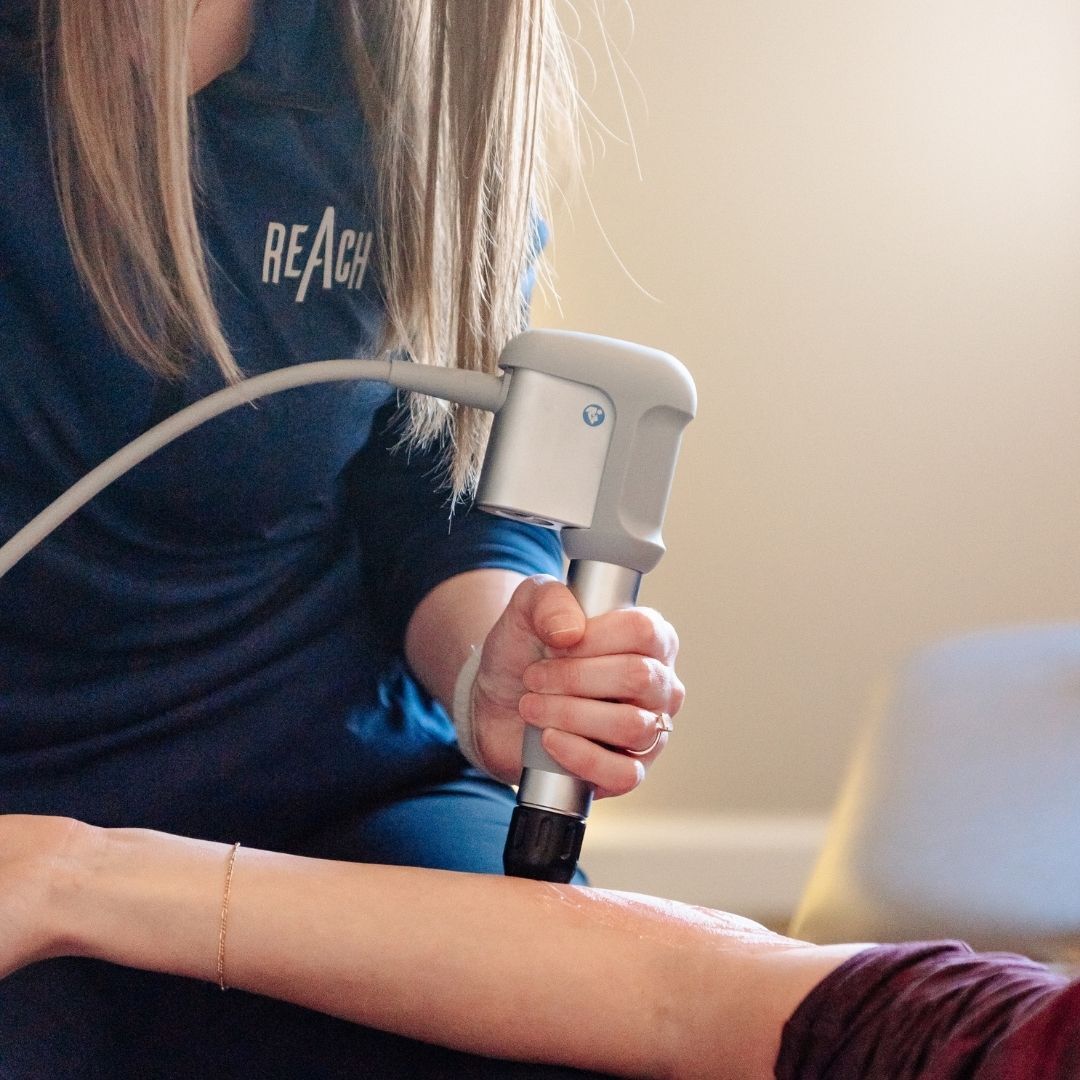 Chiropractor using shockwave therapy for plantar fasciitis